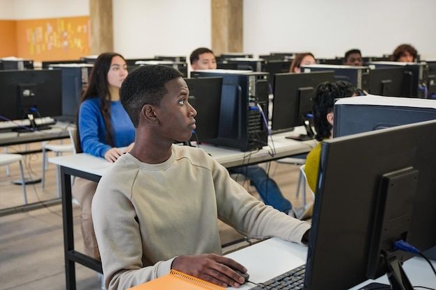 photo young multiethnic students using c…